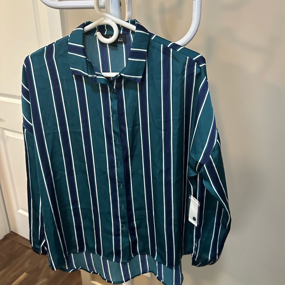 Multi-colour suitable for work shirt. Size is medium